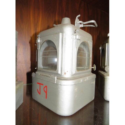 256 - A COLLECTION OF FIVE VINTAGE RAILWAY LANTERN'S