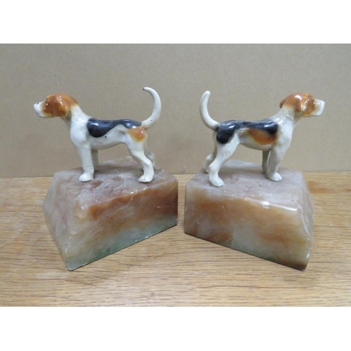 260 - A PAIR OF FOX HOUNDS ON MARBLE BASES