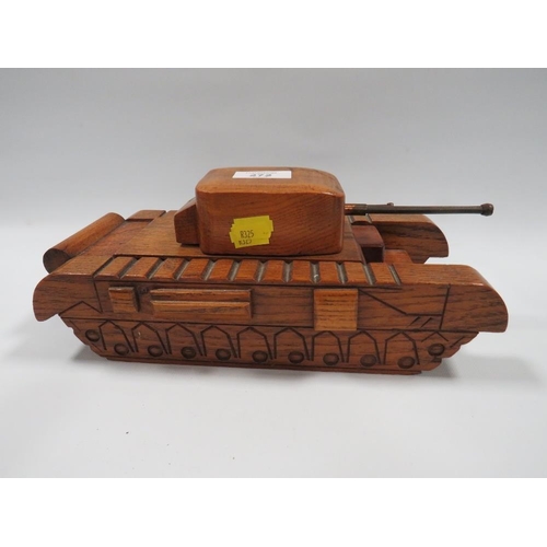 272 - A NOVELTY TREEN BOX IN THE FORM OF A TANK TOGETHER WITH A FIRST WORLD WAR HAND GRENADE INKWELL