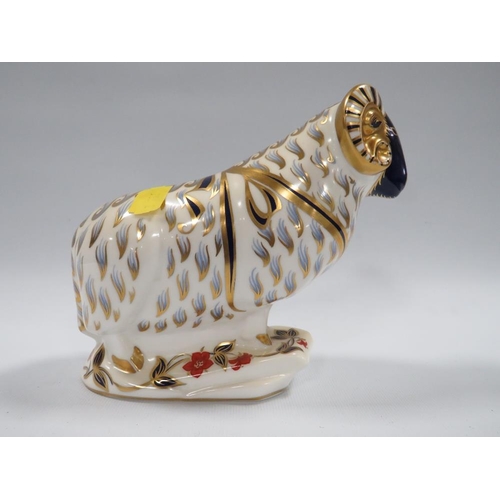 274 - A ROYAL CROWN DERBY PAPER WEIGHT IN THE FORM OF A RAM