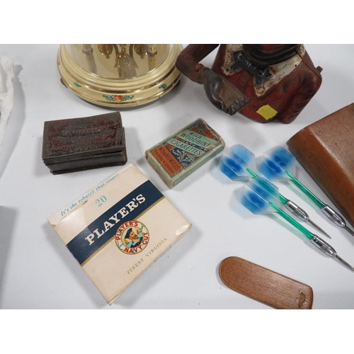 302 - A TRAY OF ASSORTED COLLECTABLE'S TO INCLUDE VINTAGE MONEY BANK , COINS, CIGARETTE CARDS ETC