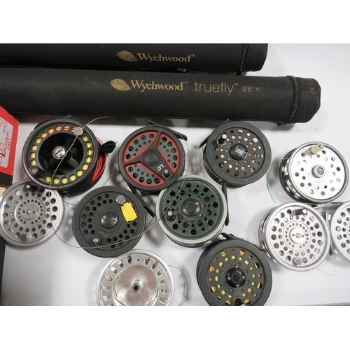 311 - A TRAY OF ASSORTED FLY FISHING REELS TOGETHER WITH ROD CASES