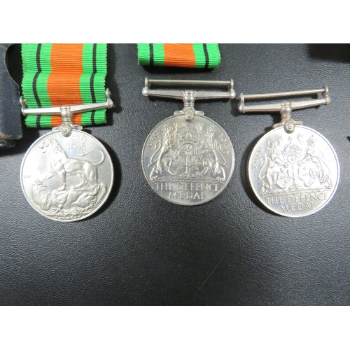 319 - A SMALL BAG OF ASSORTED MEDALS