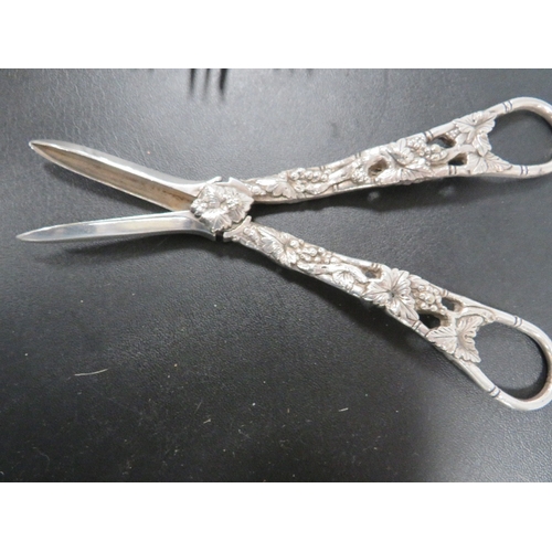 329 - A PAIR OF SILVER PLATED ORNATE GRAPE SCISSORS TOGETHER WITH A CAKE SLICE TOGETHER WITH SIX CAKE FORK... 