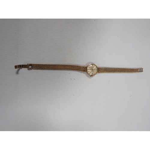 337 - A HALLMARKED 9 CARAT GOLD GARRARD WRIST WATCH A/F