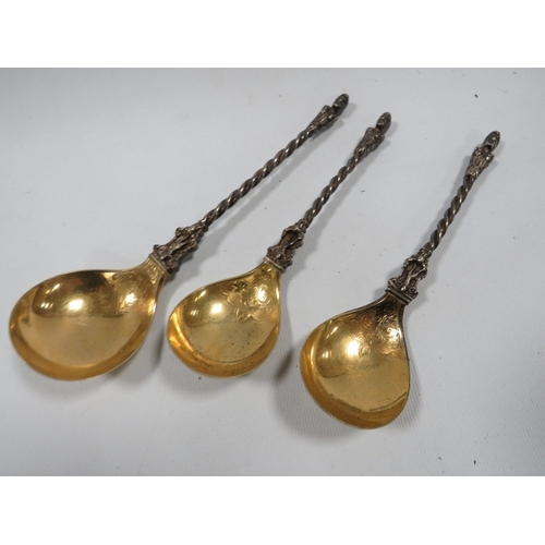 456 - THREE ANTIQUE WHITE METAL SPOONS WITH GILT BOWLS