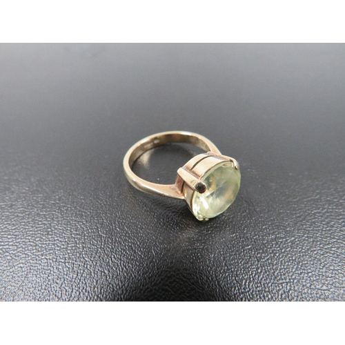 368 - A HALLMARKED 9 CARAT GOLD DRESS RING SET WITH GREEN TOURMALINE STYLE STONE approx weight 4.5g