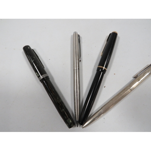 458 - A GOLD NIB PARKER FOUNTAIN PEN TOGETHER WITH A STERLING SILVER PEN & TWO OTHERS