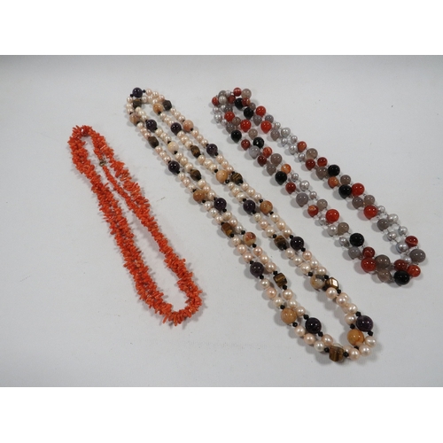 460 - TWO VINTAGE PEARL AND HARDSTONE NECKLACES & A RED STICK CORAL EXAMPLE