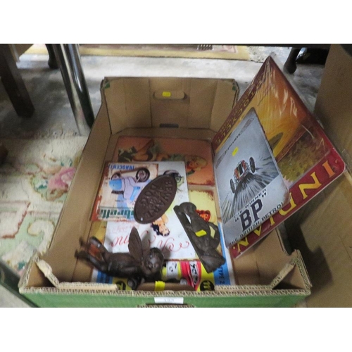 134 - A BOX OF MIXED SIGNS AND CAST IRON ETC