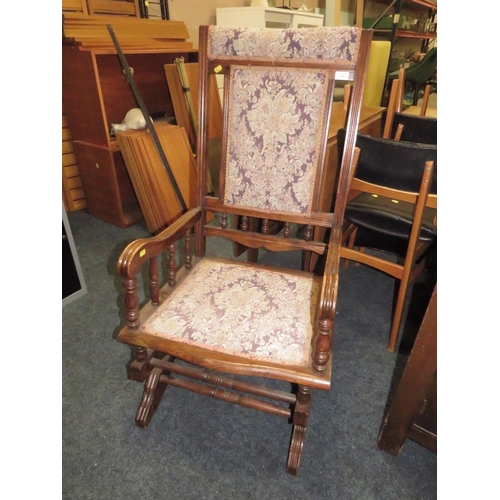 784 - AN AMERICAN STYLE ROCKING CHAIR