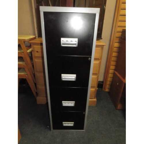 785 - A METAL FOUR DRAWER FILING CABINET