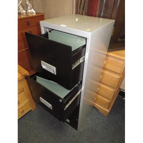 785 - A METAL FOUR DRAWER FILING CABINET