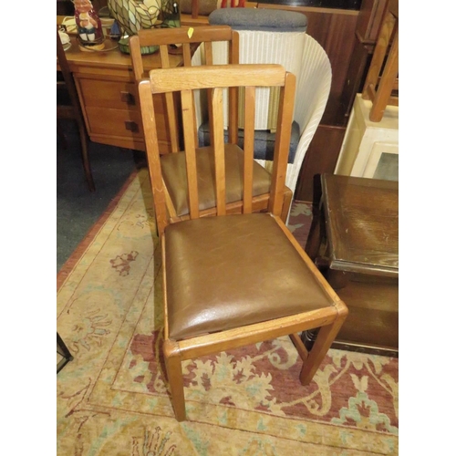 793 - AN OAK OPEN BOOKCASE, SMALL STOOL AND TWO CHAIRS PLUS A VINTAGE MEAT SAFE AND TWO OAK SIDE TABLES