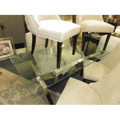 803 - A LARGE MODERN GLASS TOPPED TABLE WITH SIX UPHOLSTERED CHAIRS