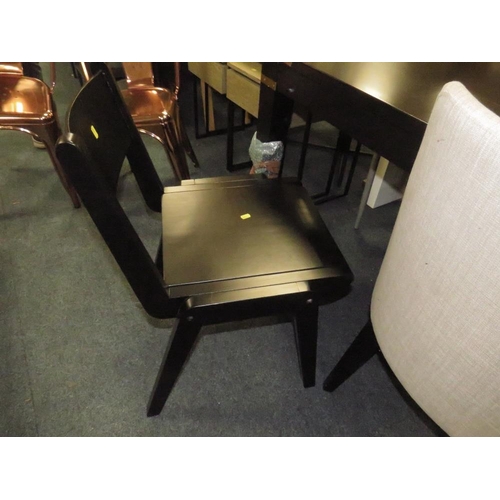 810 - A LARGE BLACK DINING TABLE WITH AN ASSORTMENT OF EIGHT CHAIRS