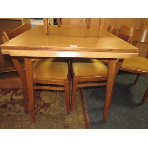 828 - A MID CENTURY 'E GOMME FOR G-PLAN' SMALL DINING TABLE AND FOUR CHAIRS