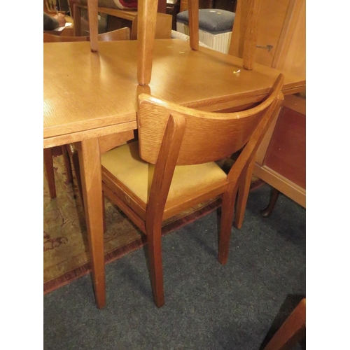 828 - A MID CENTURY 'E GOMME FOR G-PLAN' SMALL DINING TABLE AND FOUR CHAIRS