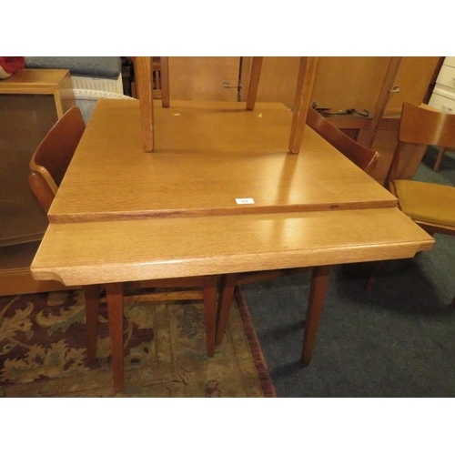 828 - A MID CENTURY 'E GOMME FOR G-PLAN' SMALL DINING TABLE AND FOUR CHAIRS