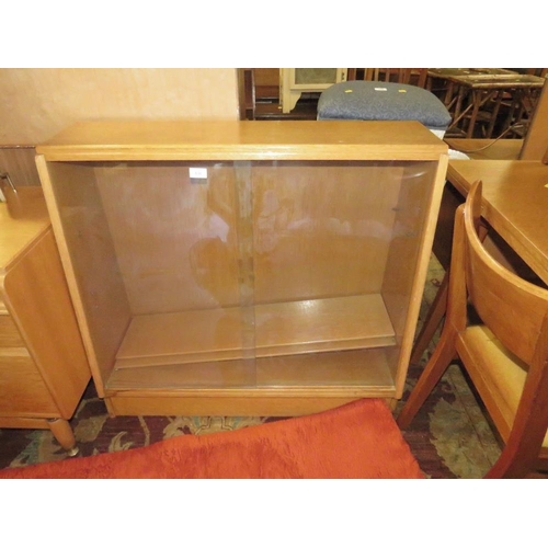 830 - A MID CENTURY OAK GLAZED BOOKCASE AND A LAMKIN RUG (2)