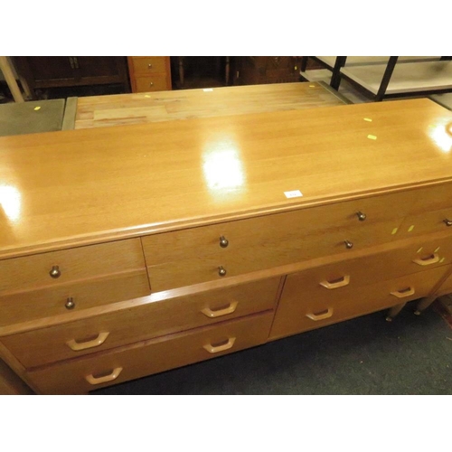 832 - A MID CENTURY 'E GOMME' FOR G-PLAN TEN DRAWER CHEST W-150 CM