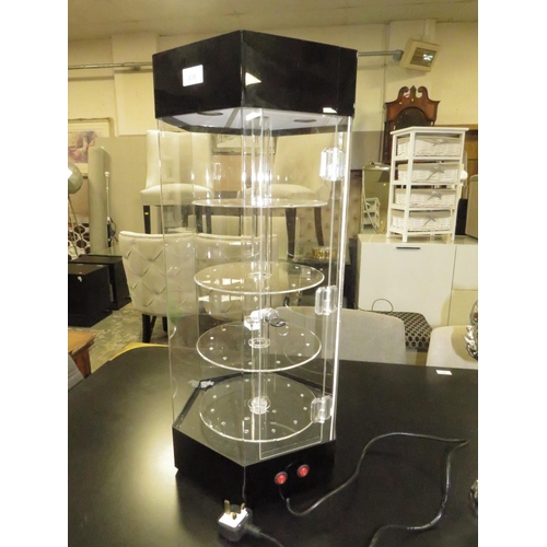 838 - A ROTATING TABLE TOP DISPLAY CABINET