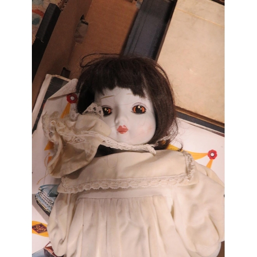 94 - A TRAY OF SUNDRIES TO INCLUDE A PORCELAIN HEAD MUSICAL DOLL , BOOKS , MAGAZINES ETC