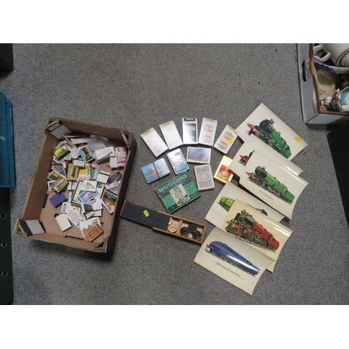 167 - A SMALL TRAY OF COLLECTABLE PLAYING CARDS , MATCHBOXES ETC