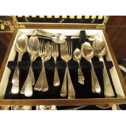 220 - AN OAK CASED CANTEEN OF CUTLERY (UNCHECKED)