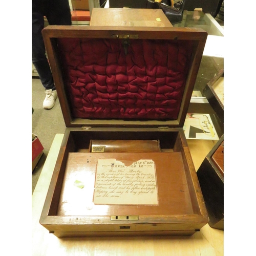 240 - A CASED STEEL REEDS ACCORDION/SQUEEZE BOX TOGETHER WITH AN INLAID WRITING SLOPE DATED 1889