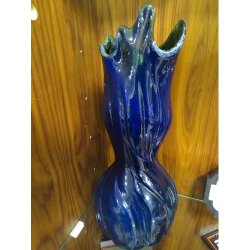 258 - AN UNUSUAL BLUE ART GLASS VASE