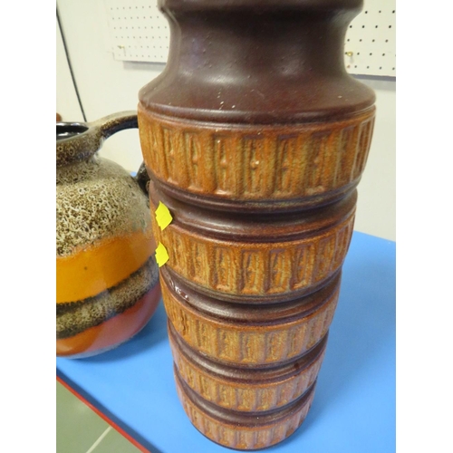 265 - A LARGE WEST GERMAN RETRO POTTERY VASE TOGETHER WITH A SIMILAR JUG (2)