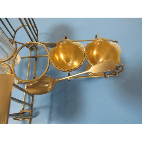 268 - A NOVELTY WIRE WORK CRUET AND EGG CUP STAND IN THE FORM OF A BI PLANE , EGG CUP HAS NO BASE