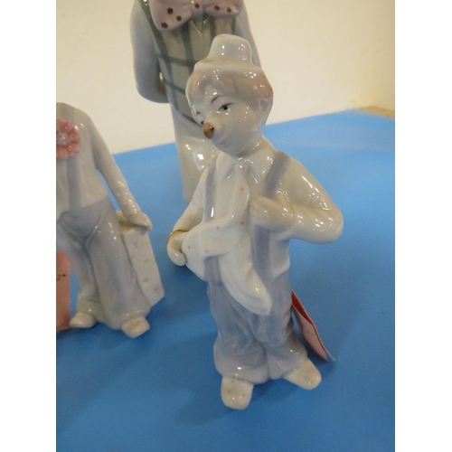 284 - FOUR SPANISH STYLE CLOWN FIGURINES