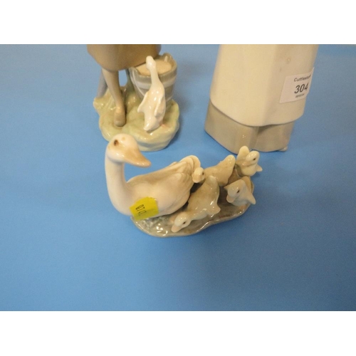 304 - TWO LLADRO FIGURINES TOGETHER WITH A LLADRO FIGURE OF GOOSE WITH GOSLINGS