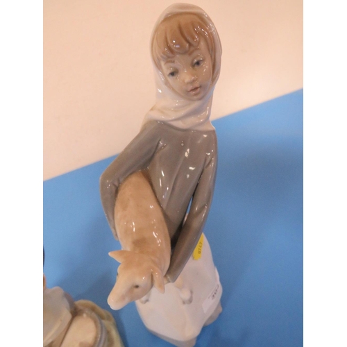 304 - TWO LLADRO FIGURINES TOGETHER WITH A LLADRO FIGURE OF GOOSE WITH GOSLINGS