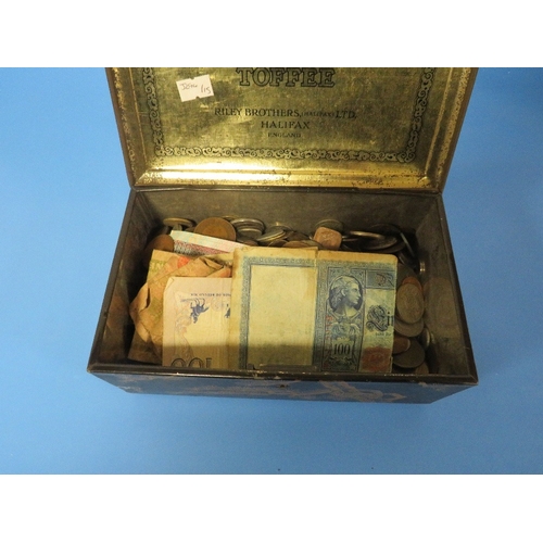 462 - A TIN OF WORLD COINS AND BANKNOTES