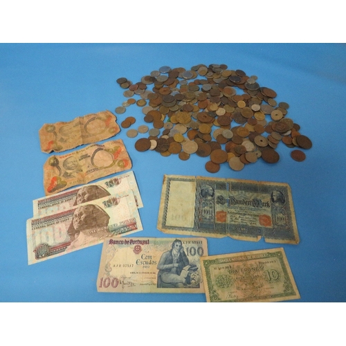 462 - A TIN OF WORLD COINS AND BANKNOTES