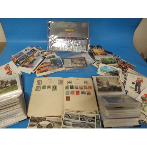 474 - A TRAY OF VINTAGE POSTCARDS. STAMP ALBUM ETC