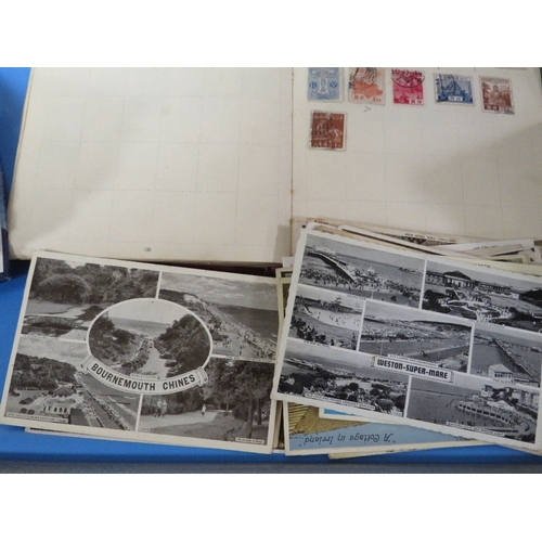 474 - A TRAY OF VINTAGE POSTCARDS. STAMP ALBUM ETC