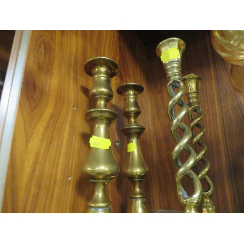 210 - THREE PAIRS OF BRASS CANDLESTICKS