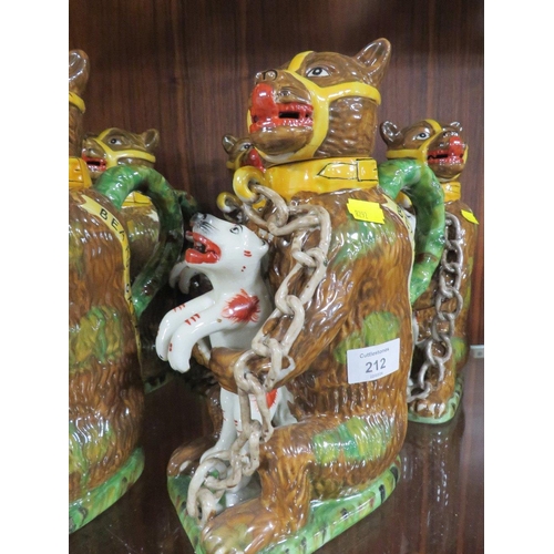 212 - FIVE REPRODUCTION NOVELTY JUGS IN THE FORM OF A CAGE BEAR HOLDING A FELINE