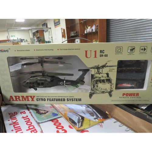 57 - BOXED ARMY 3.5 CHANNEL REMOTE HELICOPTER COMPLETE WITH REMOTE CONTROL