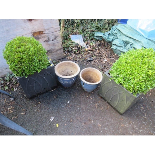 630 - FOUR PLANTERS - COMPRISING TWO PLASTIC TO INCLUDE BUSHES AND TWO CERAMIC