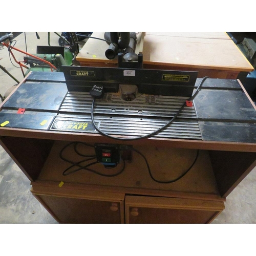 651 - A POWER CRAFT ROUTER WITH TABLE AND WORK STATIONS WITH ACCESSORIES