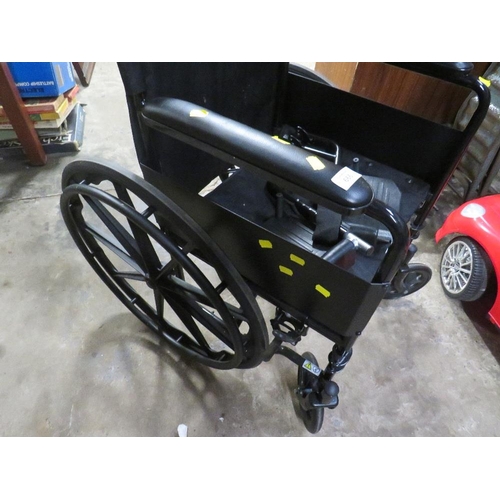 665 - A FOLD AWAY PUSH WHEELCHAIR WITH SOLID TYRES AND HANDRAIL