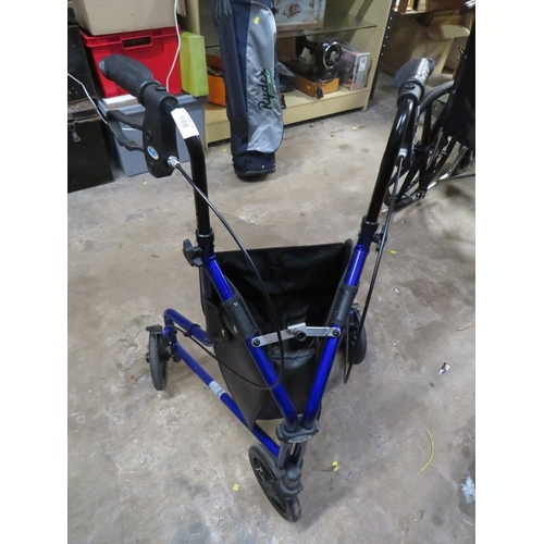 668 - A FOLD AWAY TRI-WALKER WITH SHOPPING BAG