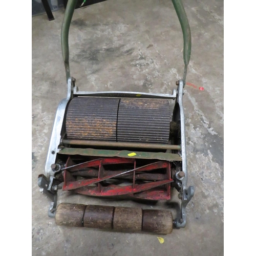 670 - A VINTAGE PUSH MOWER