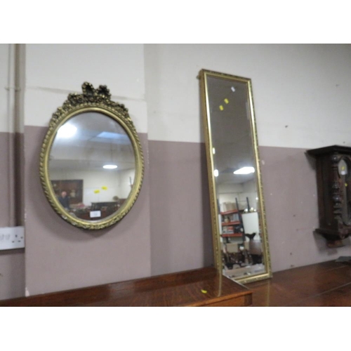 710 - AN OVAL MIRROR AND A RECTANGULAR MIRROR (2)