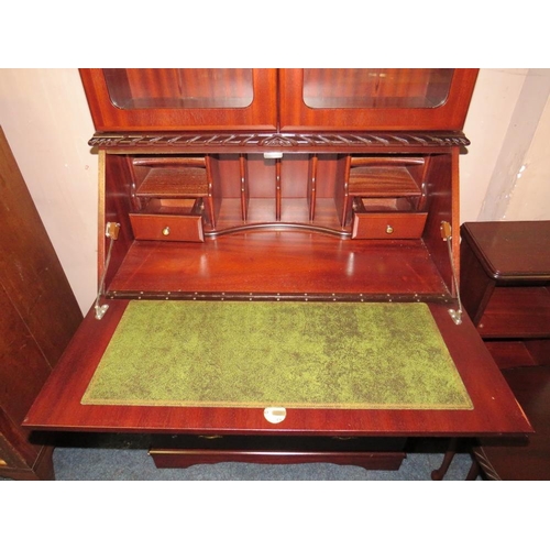 713 - A REPRODUCTION MAHOGANY BUREAU BOOKCASE